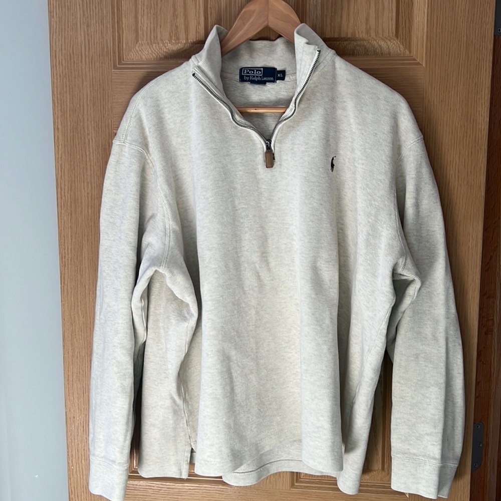 Men’s cream polo quarter zip with brown pony